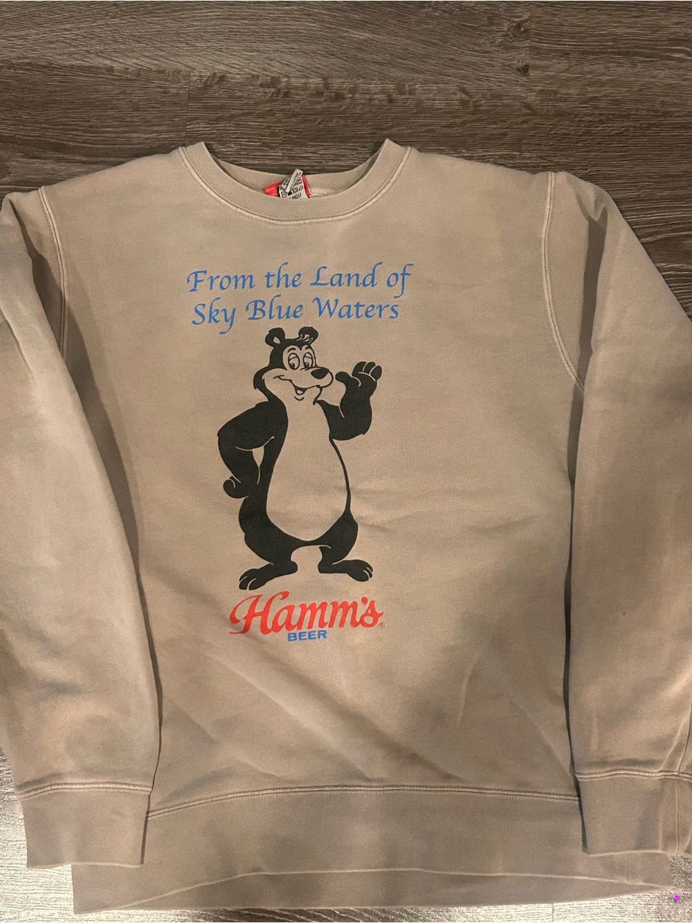 Hanes Beige Crewneck Sweatshirt with Black Bear Graphic and Blue Text